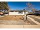 Charming single-story home with a low maintenance landscaped front yard at 4933 W 61St Ave, Arvada, CO 80003
