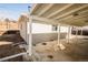 Attached covered patio with direct access to the home and backyard at 4933 W 61St Ave, Arvada, CO 80003