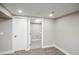 Hallway leading to a laundry room at 4933 W 61St Ave, Arvada, CO 80003