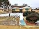 Charming brick home with a walkway leading to the front door and a well-maintained front yard at 3021 Locust St, Denver, CO 80207