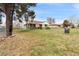 Charming single-story home featuring a well-maintained lawn and mature trees, creating a welcoming curb appeal at 3021 Locust St, Denver, CO 80207