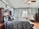 Main bedroom features a walk-in closet and plenty of natural light from large windows at 11569 Grape St, Thornton, CO 80233