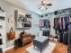 Walk-in closet with custom shelving and storage space at 11569 Grape St, Thornton, CO 80233