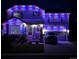 Charming two-story home featuring festive lighting, enhancing its curb appeal at night at 11569 Grape St, Thornton, CO 80233