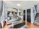 Comfortable living room with hardwood floors, stylish furniture, and bright, airy atmosphere at 11569 Grape St, Thornton, CO 80233