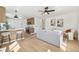Open-concept living room and kitchen with hardwood floors and ample natural light at 2295 S Sherman St, Denver, CO 80210