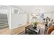 Inviting living room featuring hardwood floors, stairs and a kitchenette at 2295 S Sherman St, Denver, CO 80210