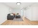 Bright living room featuring hardwood floors, modern furniture, and stylish decor at 2295 S Sherman St, Denver, CO 80210