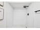 Modern shower featuring sleek, white tile and contemporary fixtures at 2295 S Sherman St, Denver, CO 80210