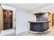 Finished basement featuring a wet bar with seating and a decorative metal gate at 10295 E Evans Ave # 114, Aurora, CO 80247
