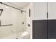 Modern bathroom featuring a frameless glass shower, a neutral-toned toilet and vanity at 10295 E Evans Ave # 114, Aurora, CO 80247