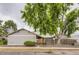 Charming home with mature trees, fenced yard, and inviting entrance at 10295 E Evans Ave # 114, Aurora, CO 80247