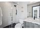 Stylish bathroom with a glass-enclosed shower and modern fixtures, vanity, and bright lighting at 1277 Quitman St, Denver, CO 80204