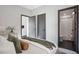 Stylish bedroom features doors to bathroom and closet, creating a convenient and private retreat at 1277 Quitman St, Denver, CO 80204