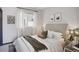 Serene bedroom featuring a plush bed, soft lighting, and stylish decor at 1277 Quitman St, Denver, CO 80204