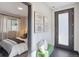 Elegant entryway with a view of the bedroom and an inviting front door at 1277 Quitman St, Denver, CO 80204