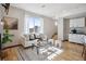 Bright living room featuring stylish seating, large windows and modern decor at 1277 Quitman St, Denver, CO 80204