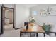 Inviting office space with a wood and metal desk and a comfortable chair at 1277 Quitman St, Denver, CO 80204
