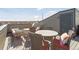 Stylish roof deck includes comfortable seating and dining space, ideal for outdoor living and socializing at 1277 Quitman St, Denver, CO 80204