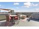 Inviting roof deck offers ample seating and a great place for entertaining, with scenic views at 1277 Quitman St, Denver, CO 80204