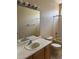 Bathroom featuring a vanity, toilet, and shower/tub combination at 20304 E 47Th Pl, Denver, CO 80249