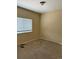 Cozy bedroom featuring neutral walls, carpet, and a window with blinds for natural light at 20304 E 47Th Pl, Denver, CO 80249
