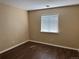 Neutral bedroom with laminate flooring and natural light at 20304 E 47Th Pl, Denver, CO 80249
