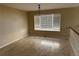 Open dining area with neutral paint, tile floors, and a large window at 20304 E 47Th Pl, Denver, CO 80249