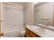 Bathroom with bathtub-shower combination and sink at 495 Bexley St, Highlands Ranch, CO 80126