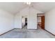 Spacious main bedroom features vaulted ceiling with ceiling fan and adjoining bathroom and walk-in closet at 495 Bexley St, Highlands Ranch, CO 80126