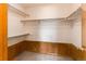 Walk-in closet featuring built-in shelving at 495 Bexley St, Highlands Ranch, CO 80126