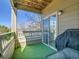 Inviting balcony with green turf, sliding door access and a pleasant view of the outdoors at 12768 Ironstone Way # 204, Parker, CO 80134