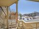 View of the stairs and exterior buildings in the community with lovely landscaping at 12768 Ironstone Way # 204, Parker, CO 80134