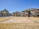 Outdoor community sand volleyball court, surrounded by well-maintained landscaping and buildings at 12768 Ironstone Way # 204, Parker, CO 80134
