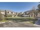 Manicured townhouse community with mature shade trees and green lawns at 2122 S Victor St # F, Aurora, CO 80014