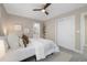 Cozy bedroom with ensuite access featuring neutral walls, carpet floors, and plenty of natural light at 1340 W 68Th Ave, Denver, CO 80221