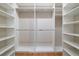 Organized walk-in closet with ample shelving and hanging space for storage at 1340 W 68Th Ave, Denver, CO 80221