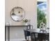 Contemporary dining area with stylish table, decor, and views of the outdoors at 1340 W 68Th Ave, Denver, CO 80221