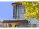 Modern building exterior with unique architectural details and a Midtown sign at 1340 W 68Th Ave, Denver, CO 80221
