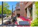 Charming outdoor dining area featuring tables, chairs, and views of the surrounding area at 1340 W 68Th Ave, Denver, CO 80221