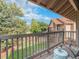 Outdoor patio with peaceful views of the yard, neighborhood, and gorgeous landscape at 15789 Sandtrap Way, Morrison, CO 80465