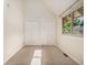 Spacious bedroom with neutral walls features double closets and a large window providing natural light at 15789 Sandtrap Way, Morrison, CO 80465