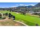 Scenic view of the golf course winding through the community, with the mountains in the background at 15789 Sandtrap Way, Morrison, CO 80465