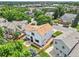 Home with a spacious backyard, showcasing its proximity to nearby shopping and amenities at 9717 Castle Ridge Cir, Highlands Ranch, CO 80129