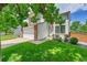 Inviting two-story home with a manicured lawn and a convenient two car garage at 9717 Castle Ridge Cir, Highlands Ranch, CO 80129