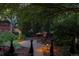 Landscaped backyard nook with a stone path and outdoor seating at 1275 N Franklin St, Denver, CO 80218