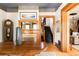 Elegant foyer with hardwood floors, a fireplace, and staircase, creating a warm and inviting entrance at 1275 N Franklin St, Denver, CO 80218