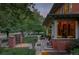 Charming brick home with landscaped front yard, inviting porch, and gated entrance at 1275 N Franklin St, Denver, CO 80218