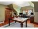 Office space features a large desk, dark trim, built in desk and lots of natural light at 1275 N Franklin St, Denver, CO 80218