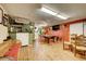 Finished basement area with a pool table, bar, and ample entertainment space at 2551 S Carson Way, Aurora, CO 80014